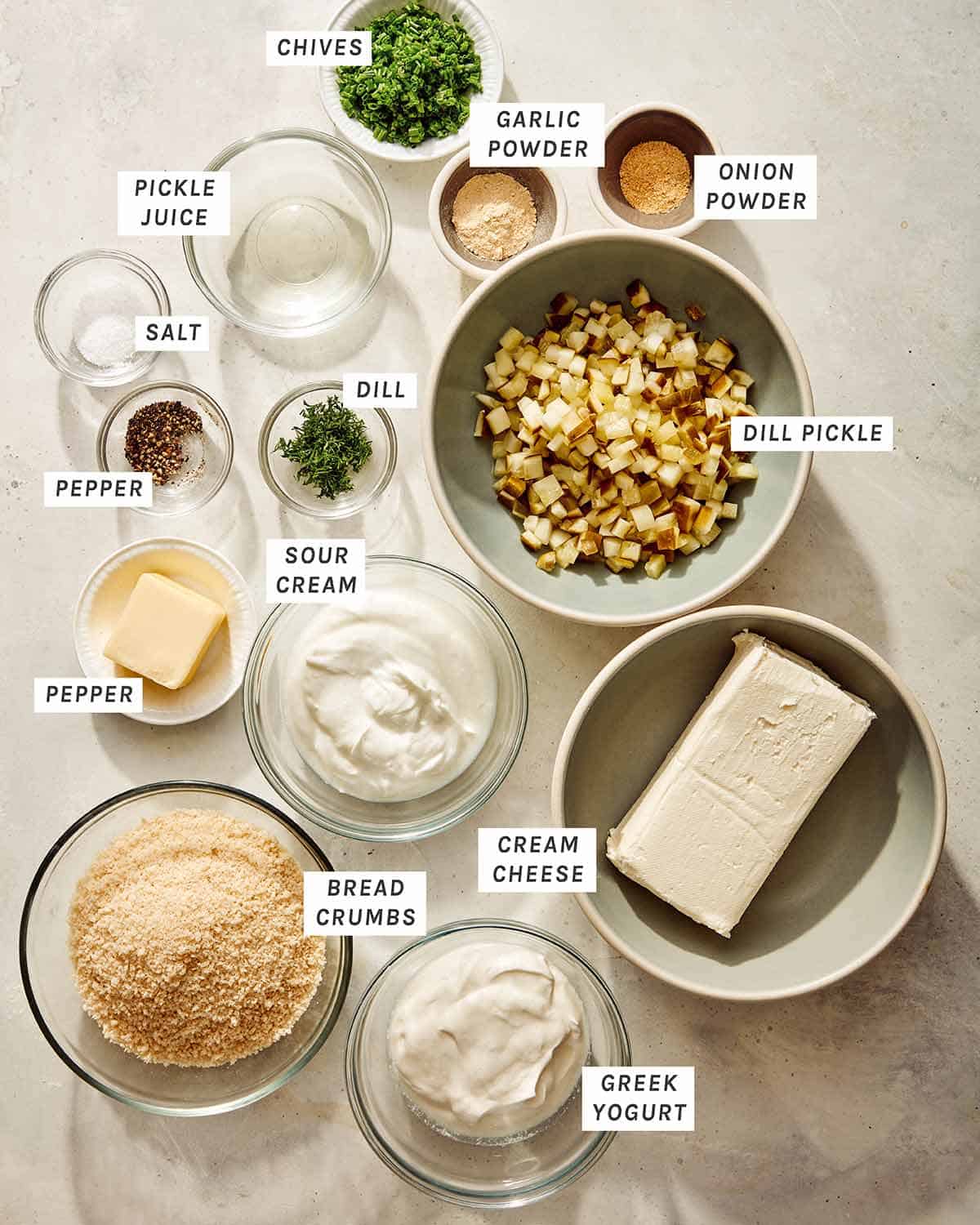 Fried pickle dip ingredients all laid out on a kitchen counter. 