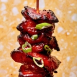 Close up on an air fryer chicken skewer.