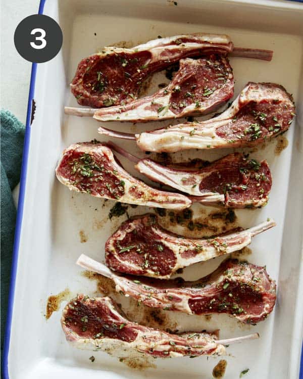 Garlic Butter Lamb Chop in a baking dish marinating.
