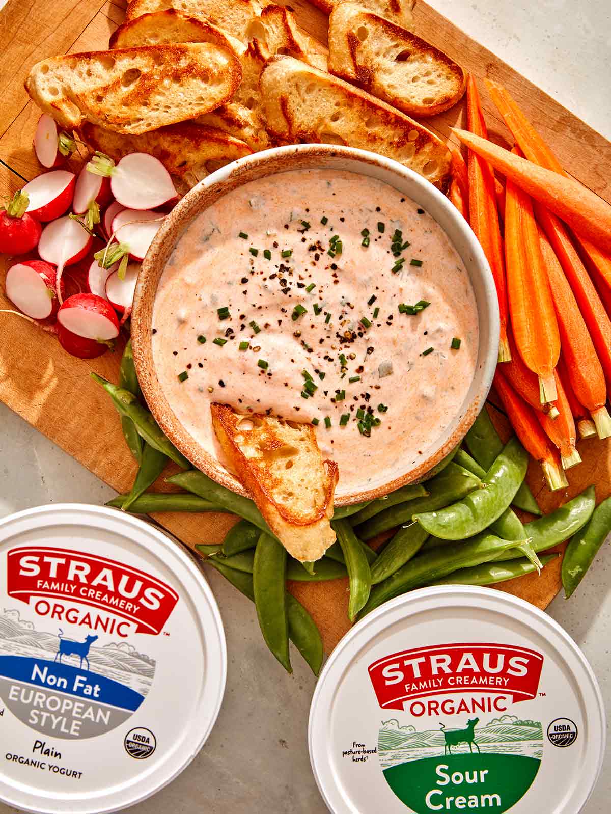 Dill pickle dip with veggies on the side.