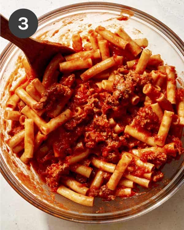 Marinara sauce mixed with pasta and meat. 