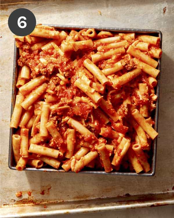 Ziti mixture loaded in a baking dish. 