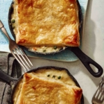 Easy chicken pot pie recipe made in a skillet with a fork in it.