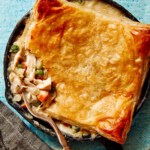 Close up on a chicken pot pie in a skillet.