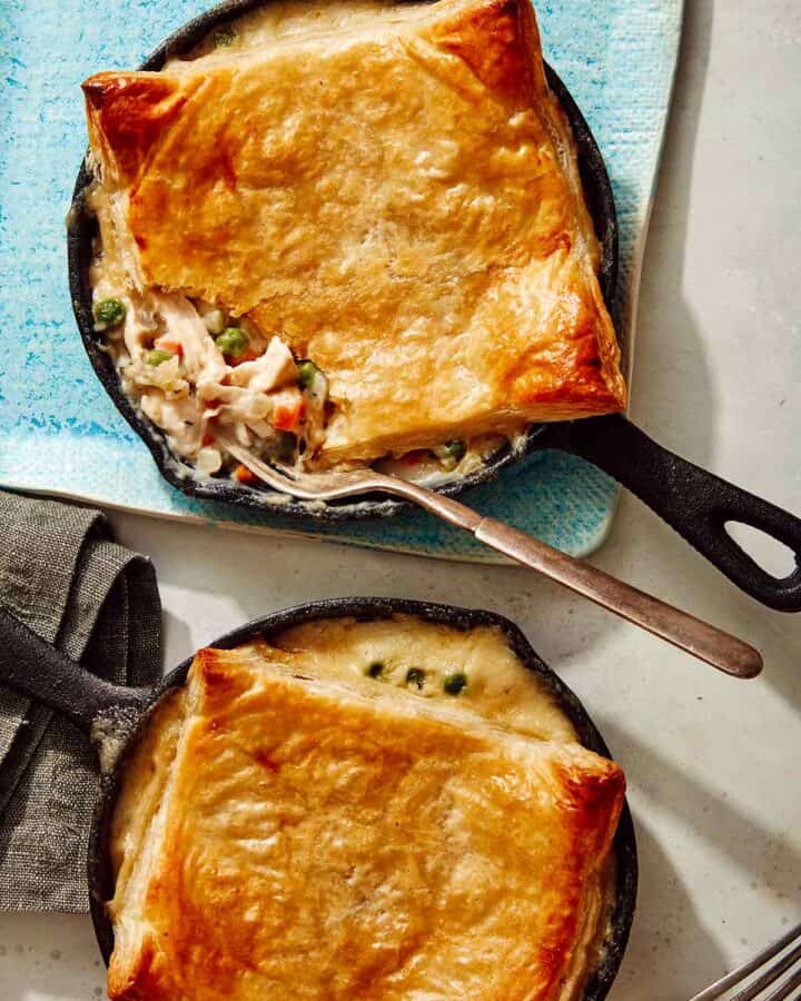 Easy chicken pot pie recipe made in a skillet with a fork in it.