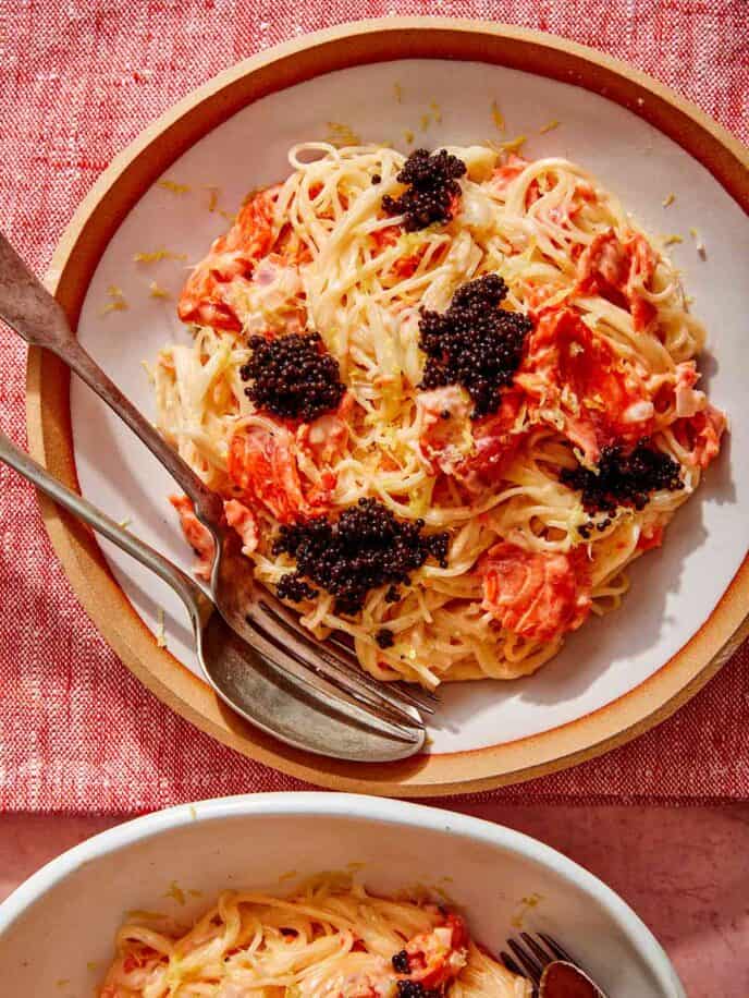 Smoked salmon pasta in two bowls.