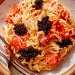 Smoked salmon pasta in a bowl close up.