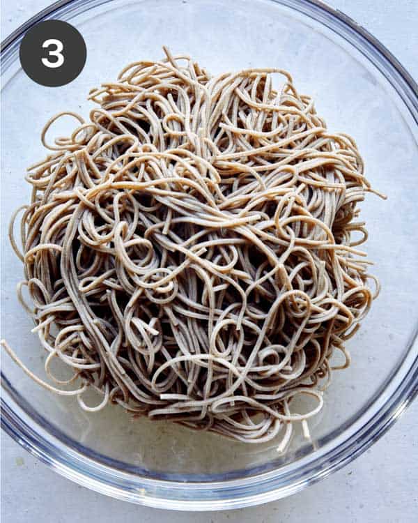 Soba noodles drained and cooked in a bowl. 