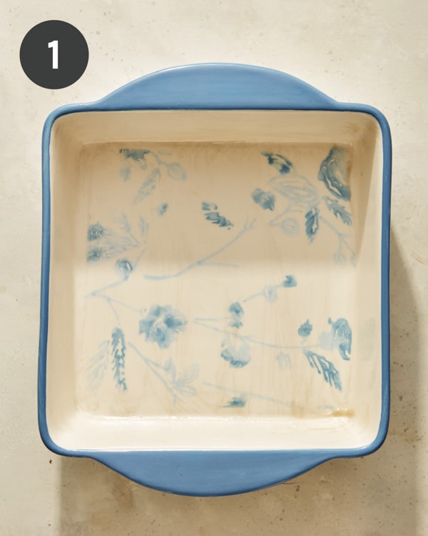 Spoon bread baking dish smeared with butter.