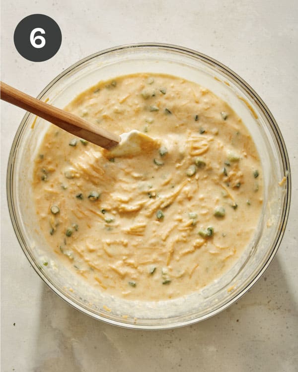 Spoon bread batter in a glass bowl. 