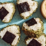 Spicy tuna onigiri on plate.