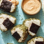 Spicy tuna onigri on a plate.