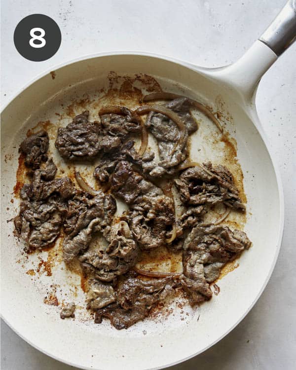 Cooked beef bulgogi in a skillet.