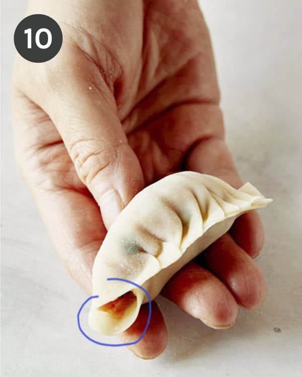 The process of pleating a potsticker. 
