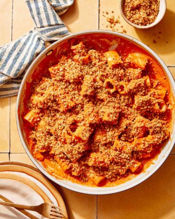 Romesco sauce pasta in a skillet ready to be served.