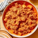 Romesco sauce pasta in a skillet ready to be served.