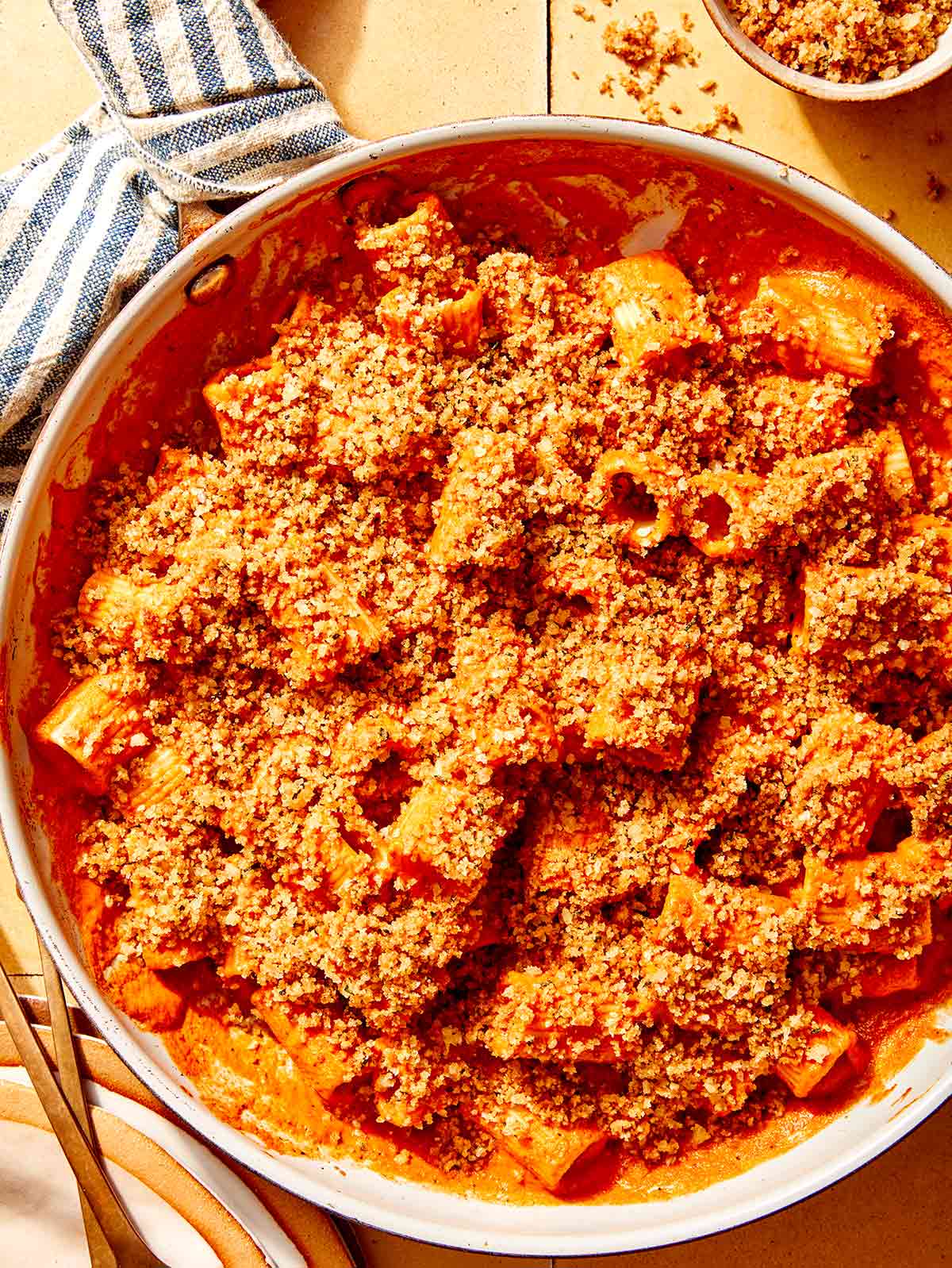 Romesco sauce pasta close up in a skillet. 