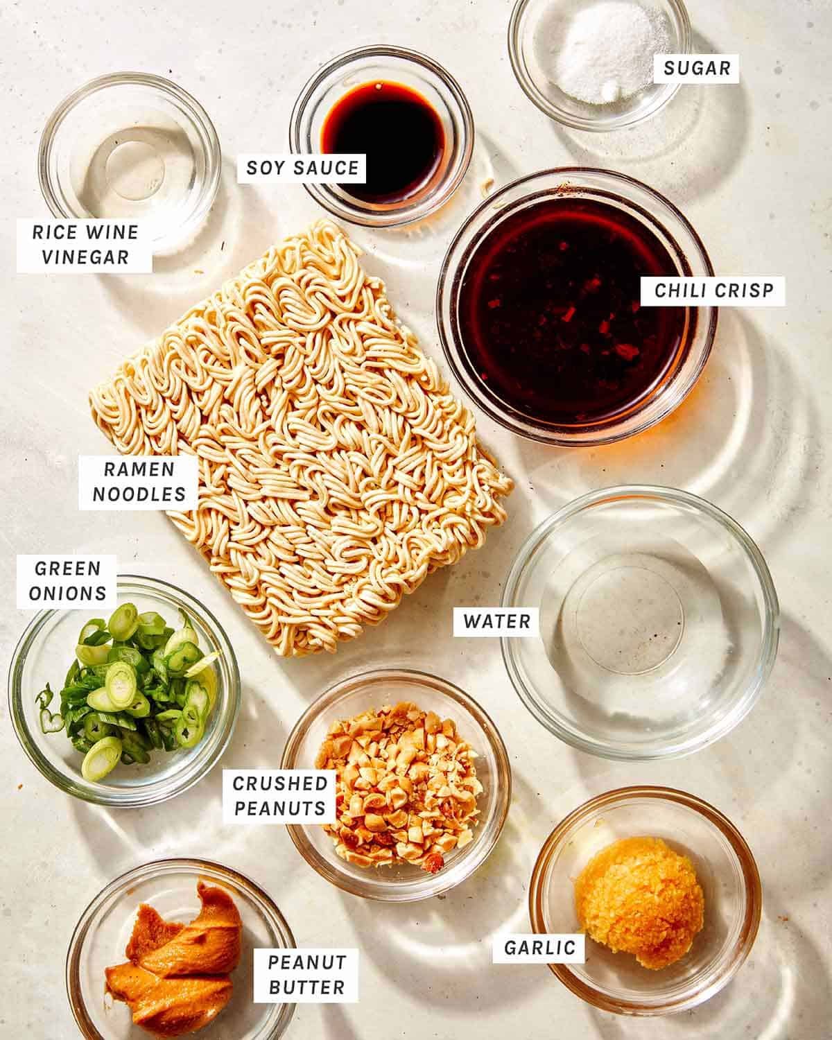 Spicy ramen noodles ingredients in a kitchen.