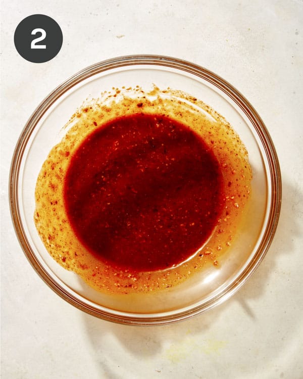 Spicy sauce for ramen noodles in a bowl.