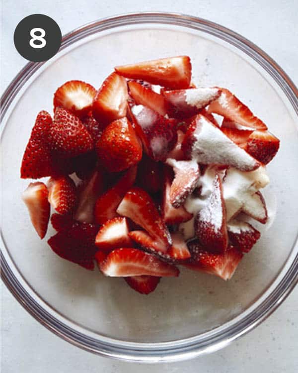 Strawberry ingredients for strawberry shortcake in a bowl.