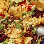 Close up on a taco salad in a big bowl.