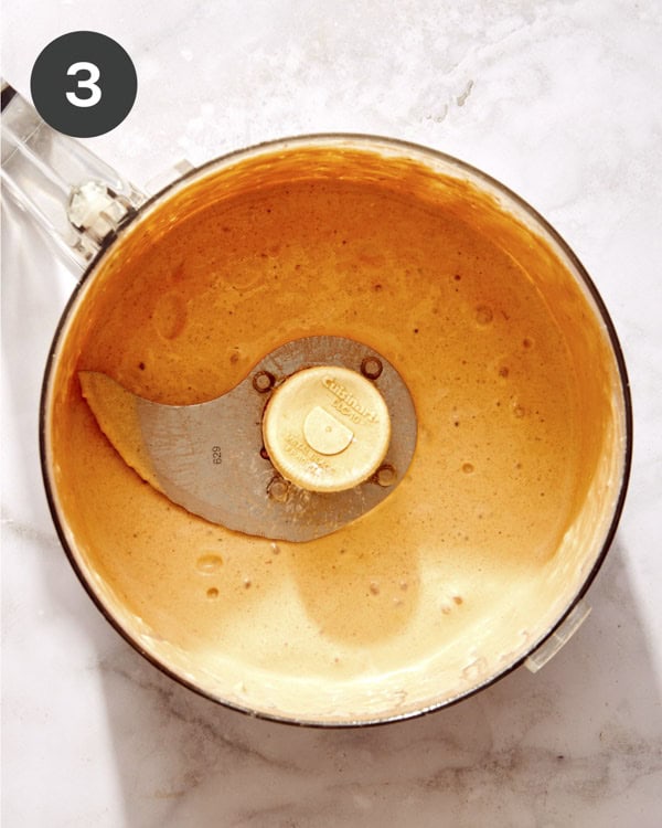 Creamy chipotle dressing in a food processor.