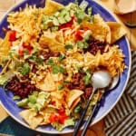 Close up on a taco salad in a big bowl.