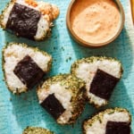 Spicy Tuna Onigiri recipe on a plate with masago sauce.