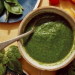 Basil vinaigrette recipe in a bowl ready to be drizzled on a salad.