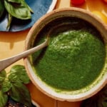 Basil vinaigrette recipe in a bowl ready to be drizzled on a salad.