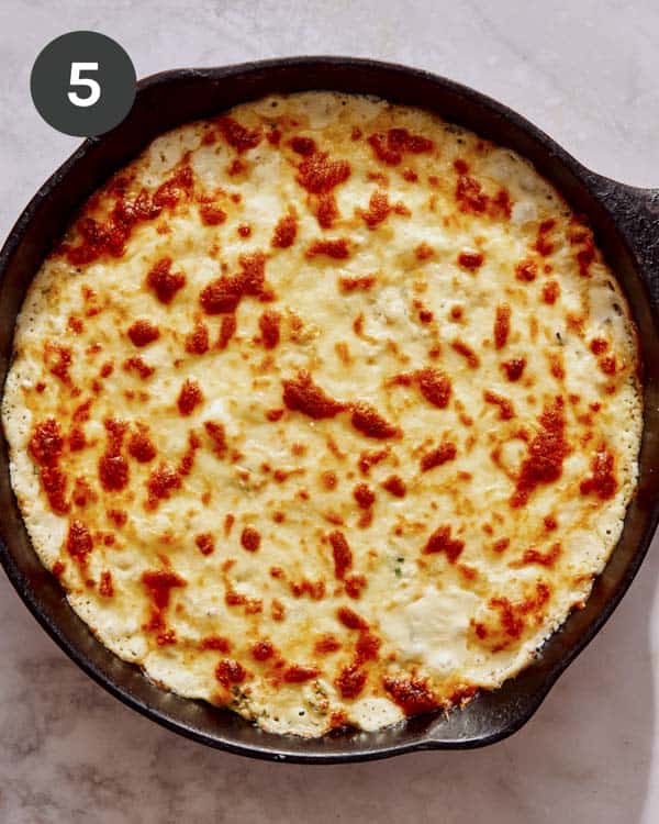 Crab dip baked in a skillet.