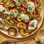 Tomato salad on a plate with some served.