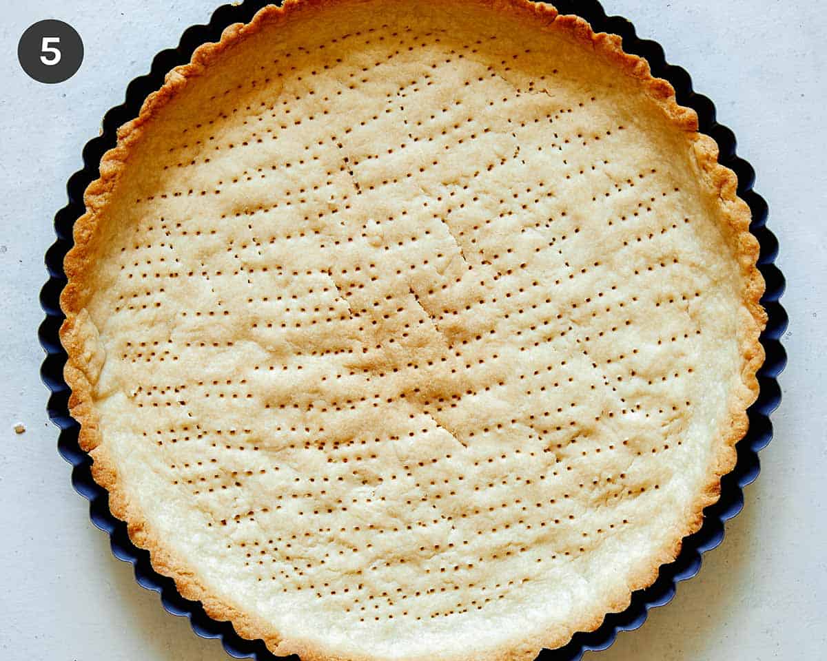 Golden brown tart shell freshly baked.