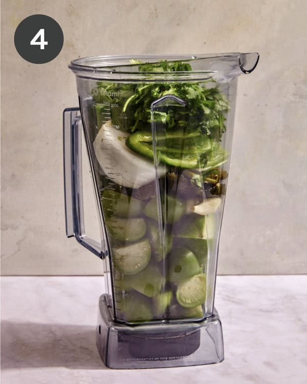 Tomatillo ingredients in a blender for soup.
