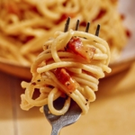 Carbonara wound onto a fork.