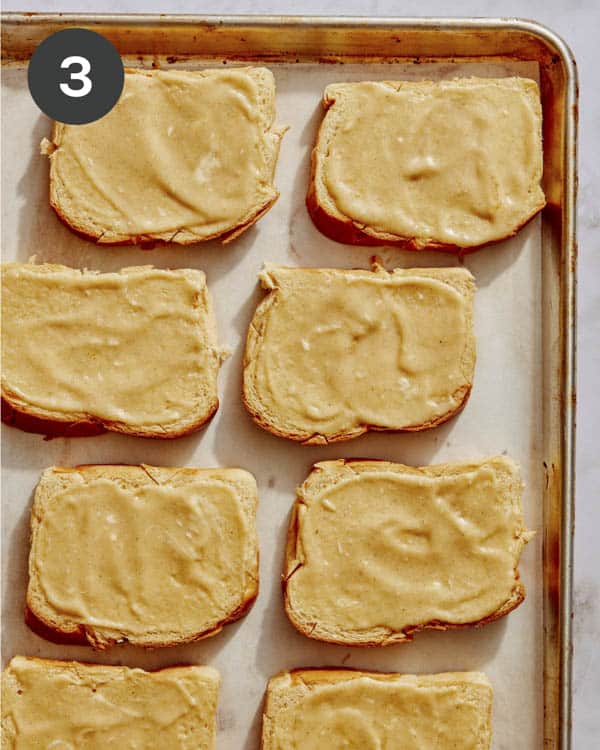 Custard smeared on top of the brioche bread.