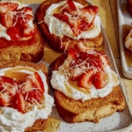 Honey toast with various toppings on a platter.