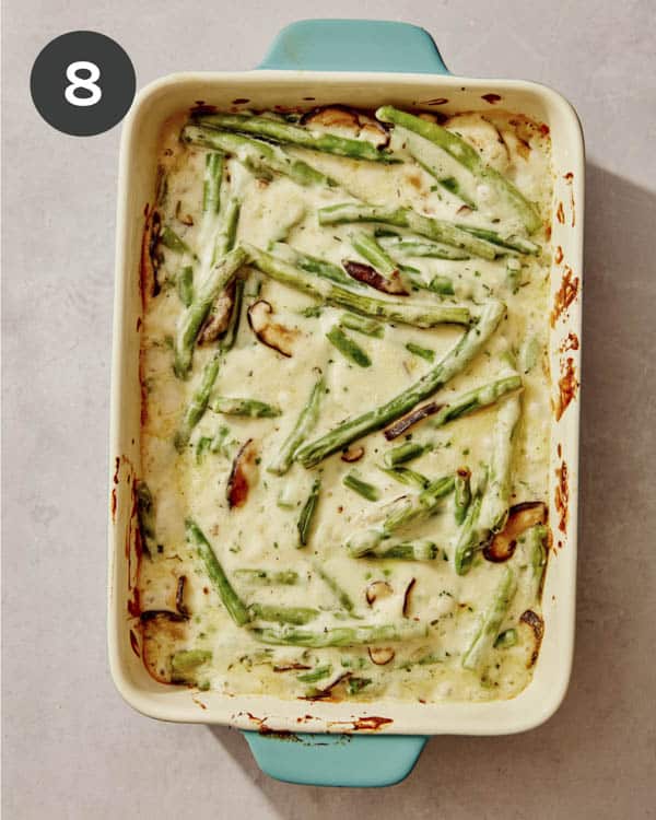 Freshly baked green bean casserole ready for toppings.