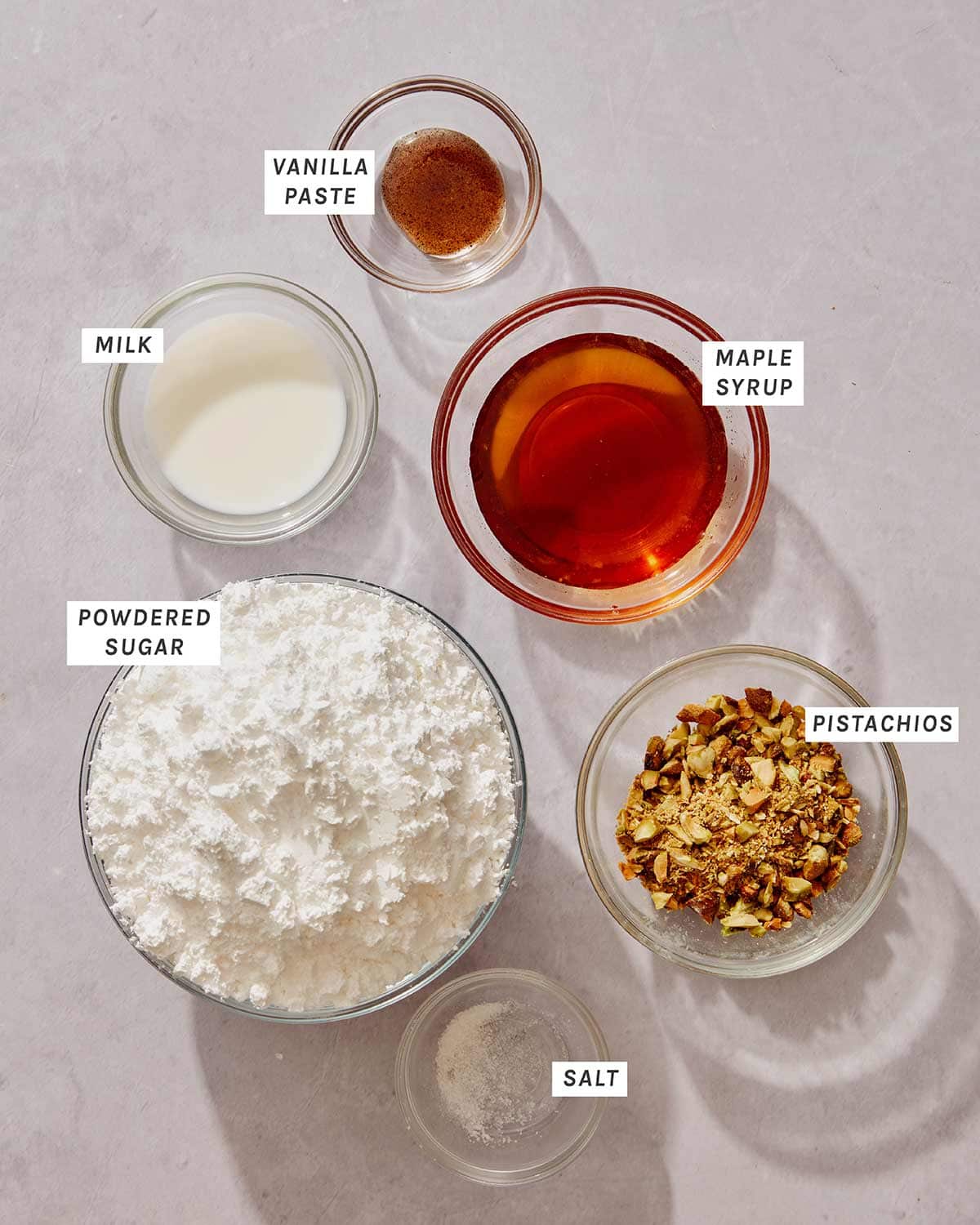 Pistachio glaze ingredients on a kitchen counter.