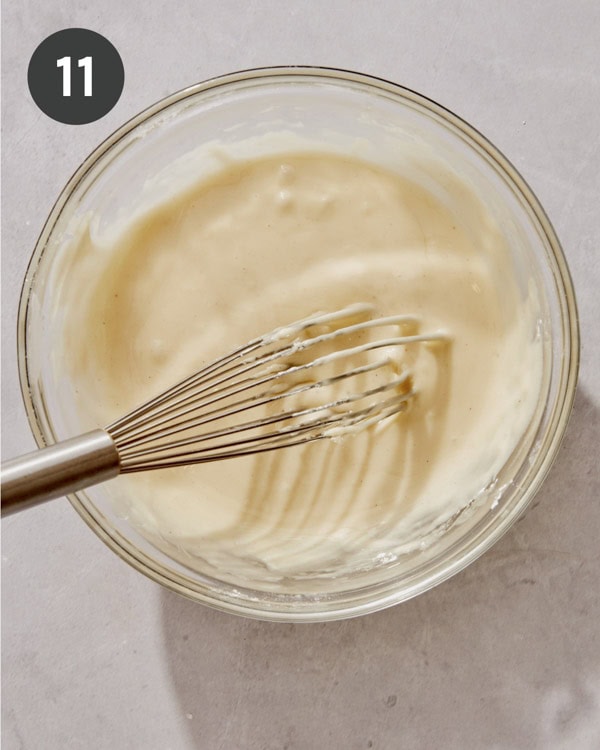 Pistachio glaze whisked together in a bowl.
