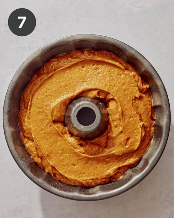 Pumpkin cake batter in a bundt pan.