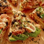 Close up on a slice of sushi pizza.