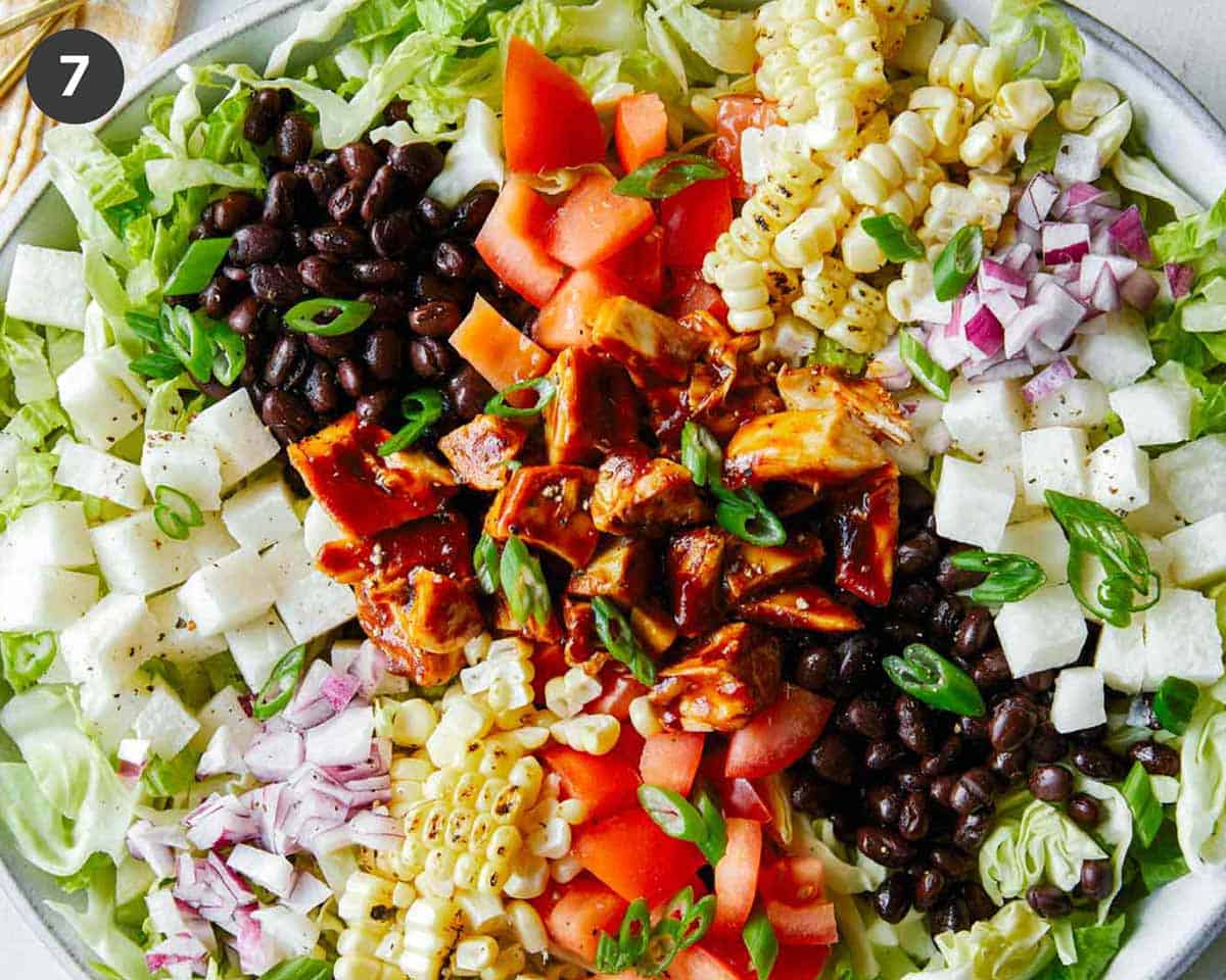 Close up on a bbq chicken salad in a big bowl.