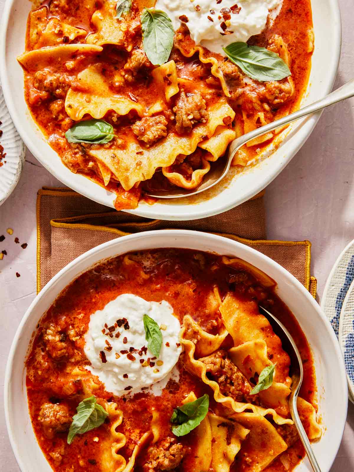 Lasagna soup served in two bowls. 