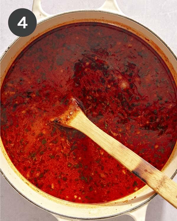 Lasagna soup base in a pot simmering. 