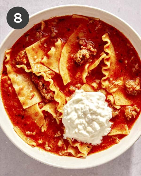 Lasagna soup with burrata on top. 