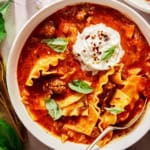 Lasagna soup recipe in a bowl with a spoon.