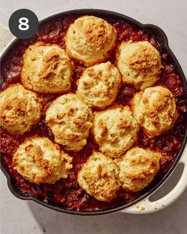 Close up on a skillet of cornbread casserole.