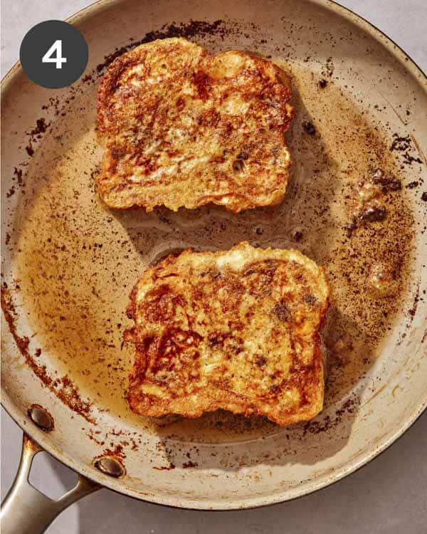 French toast cooking in a skillet.