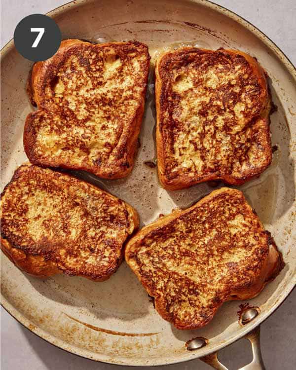 French toast slices in a skillet right out of the oven.